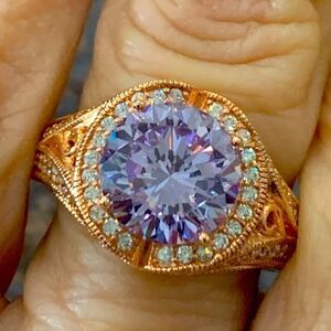 Gorgeous designer ring . Lavender and white CZ set in Rose gold over silver